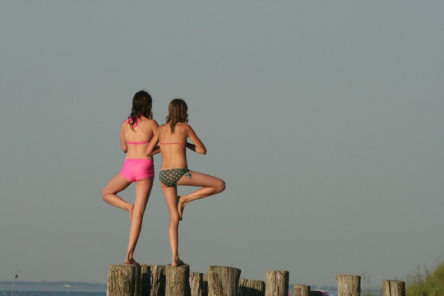 If you're very good at keeping your balance, like this two girls, you're surely more immune to virtual sickness